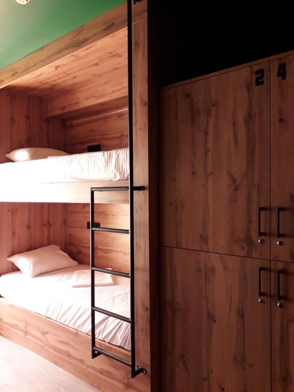 Full House Capsule Hostel Rivne Exteriör bild Bunk beds in a hostel