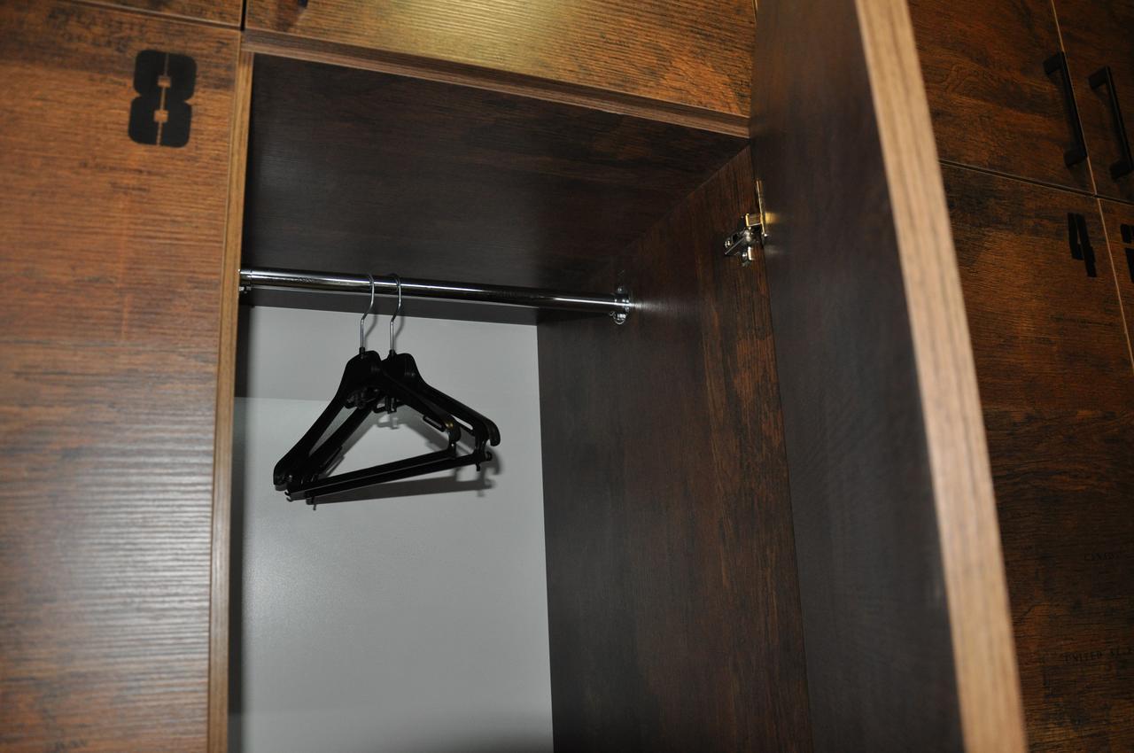 Full House Capsule Hostel Rivne Exteriör bild A coat hanger in a wardrobe