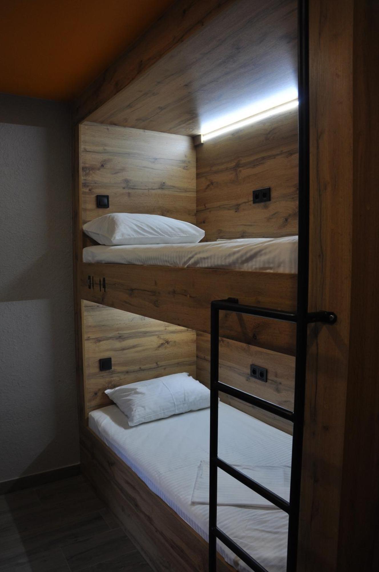 Full House Capsule Hostel Rivne Exteriör bild Hostel beds
