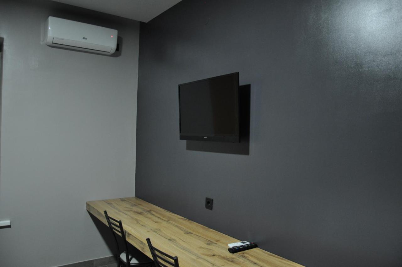 Full House Capsule Hostel Rivne Exteriör bild A wall-mounted television