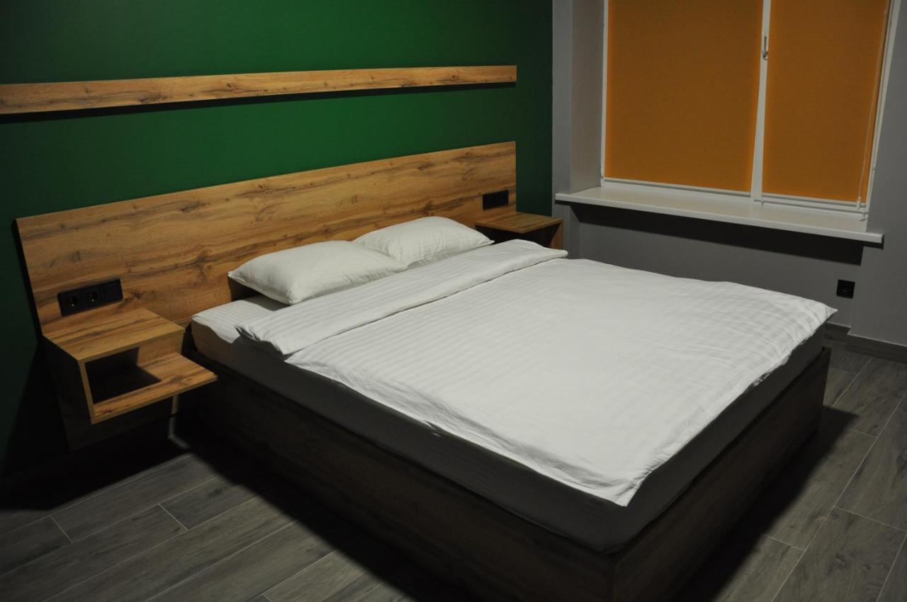 Full House Capsule Hostel Rivne Exteriör bild A bed