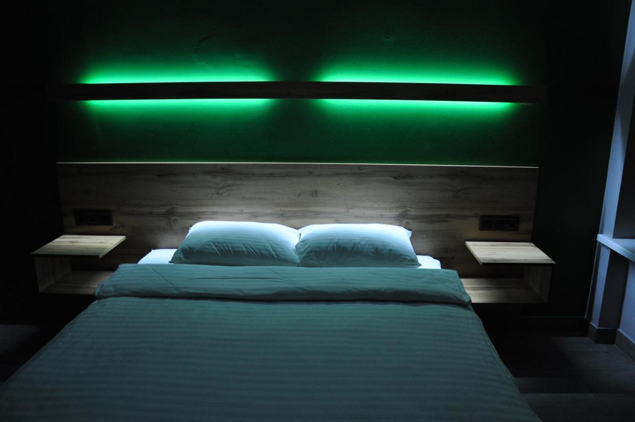 Full House Capsule Hostel Rivne Exteriör bild A room at the hotel
